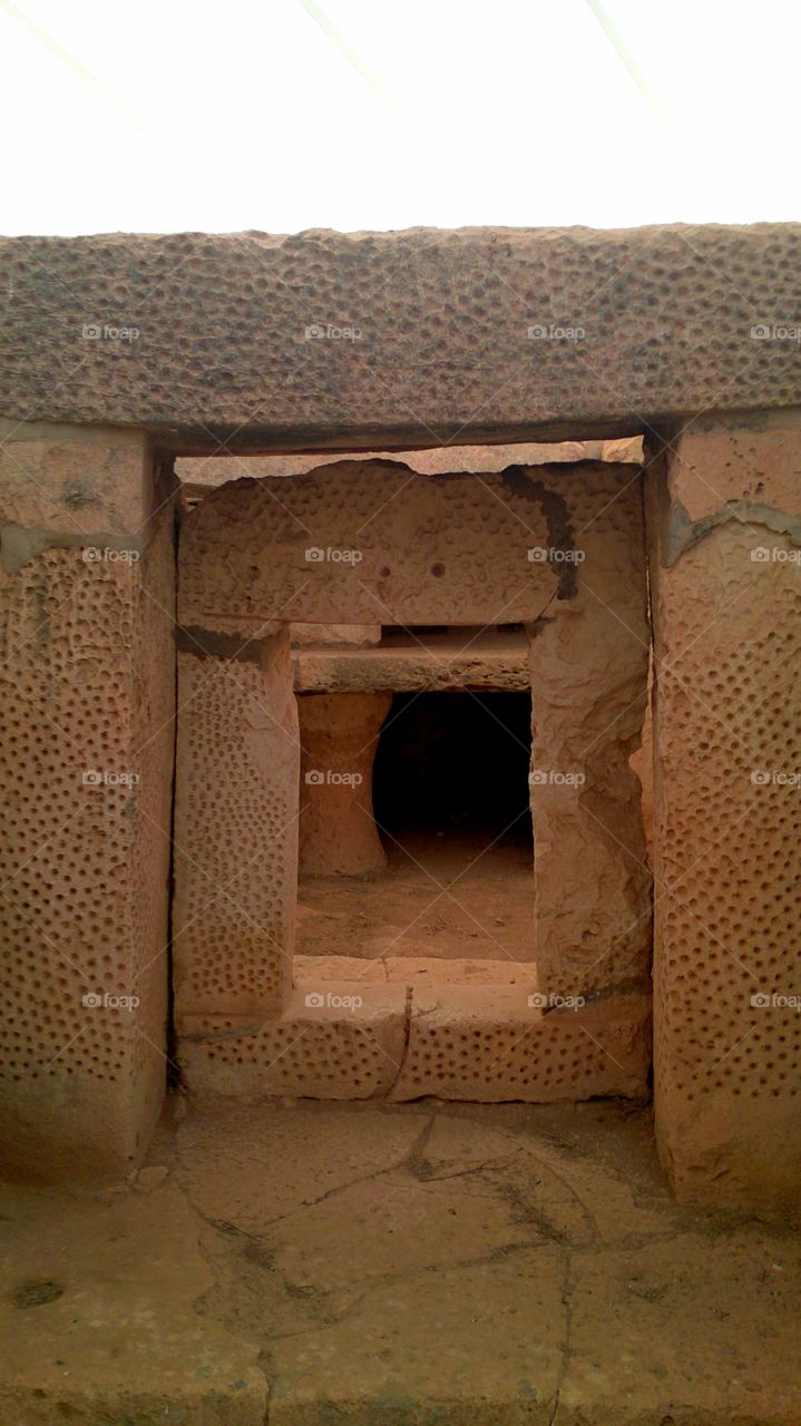 A Neolithic corridor: the UNESCO world heritage site of Hagir Oim. this is inside the temple ruins, the oldest standing structure in the world.