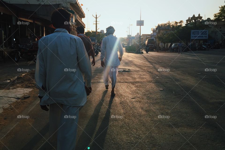Men walking the streets of India