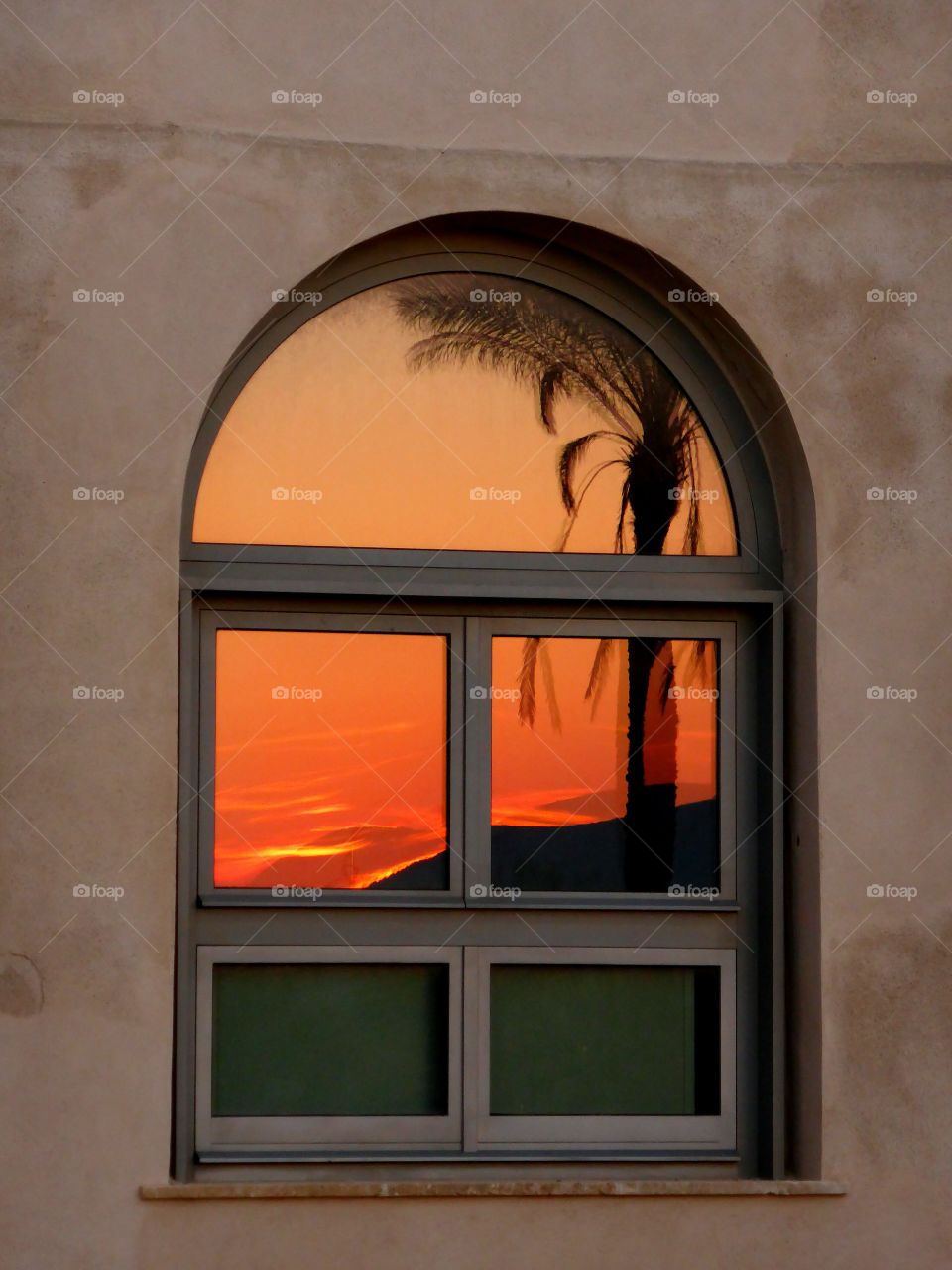 Sunset seen in a window