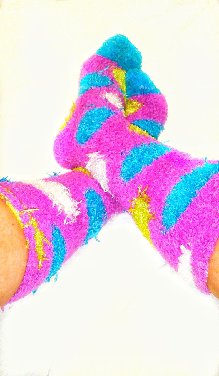 wearing long fuzzy Poke a dots socks