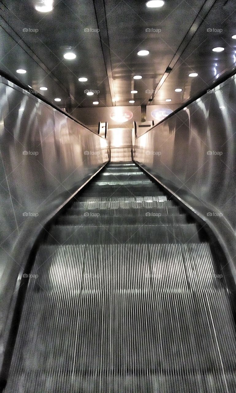 escalator at the flaminia metro station Rome on early sunday morning
