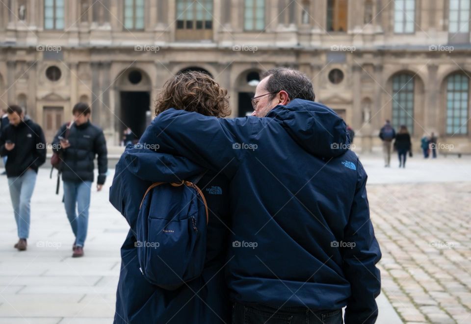 Father and son walking together