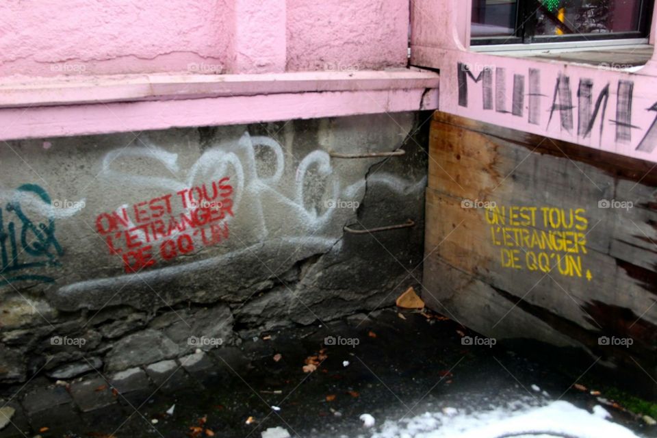 Swiss graffiti. Graffiti in Switzerland that reads that we are all someone else's stranger 
