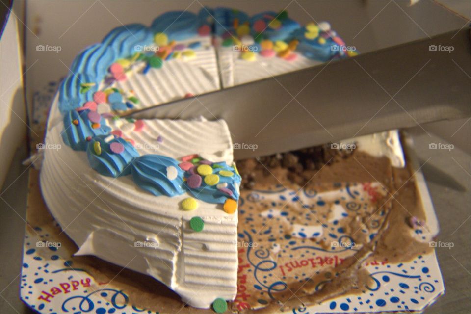Ice Cream Cake Being Cut