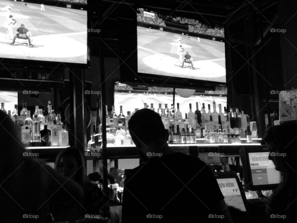 watching baseball at the bar. Supporting your team