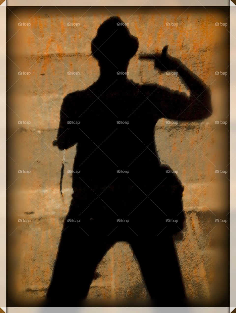 the man shooting at his shadow