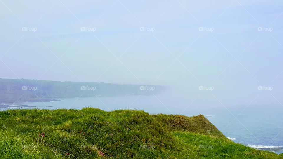 Arbroath cliffs to Auchmithie v2 Upon walking across the Arbroath cliffs to Auchmithie and Lunan bay I found a crag overlooking the quiet little seafront town. The photo does not do the mist any justice, it was an experience I'd love to share to all!