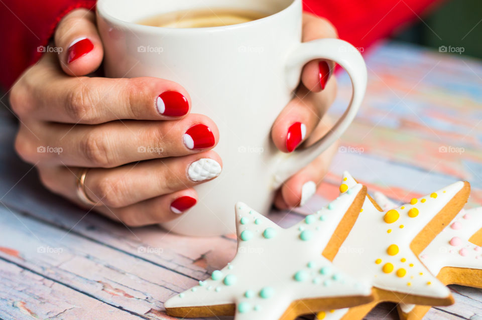 woman hand with cup of tea