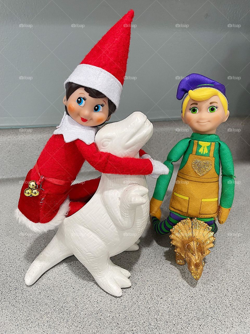 Elf on the shelf antics, elves riding dinosaurs, Christmas elves in the kitchen, entertaining children 