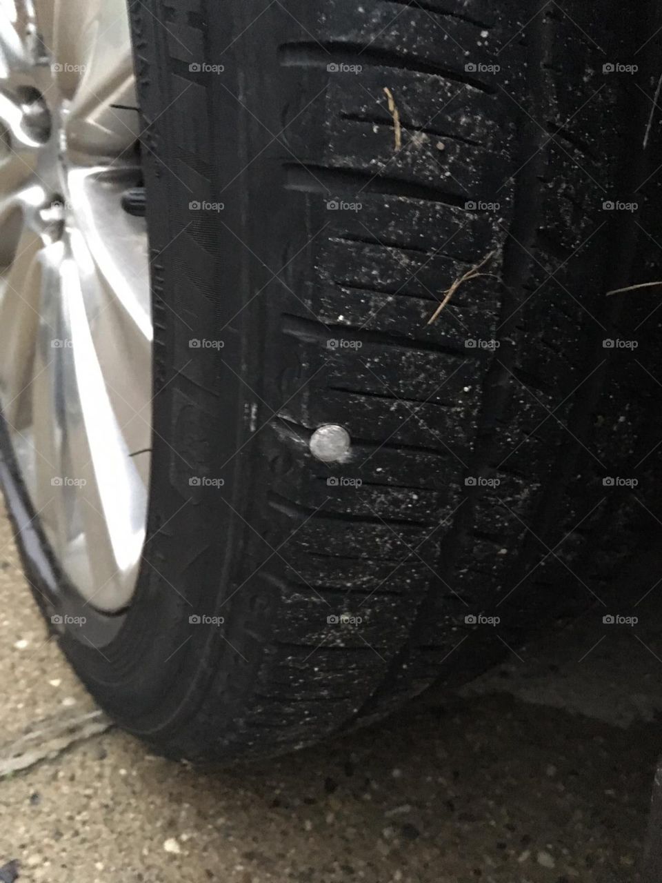 Tire with nail in it
