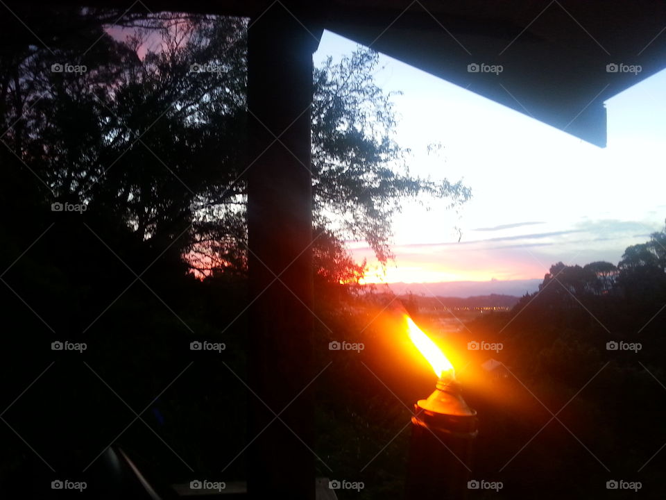 The view from my balcony as night time sets in candles, sunsets, rest.