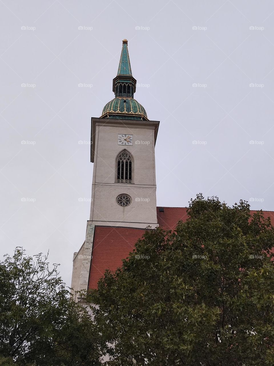 Mainly cloudy.  The church on such a day looks mesmerizing.
