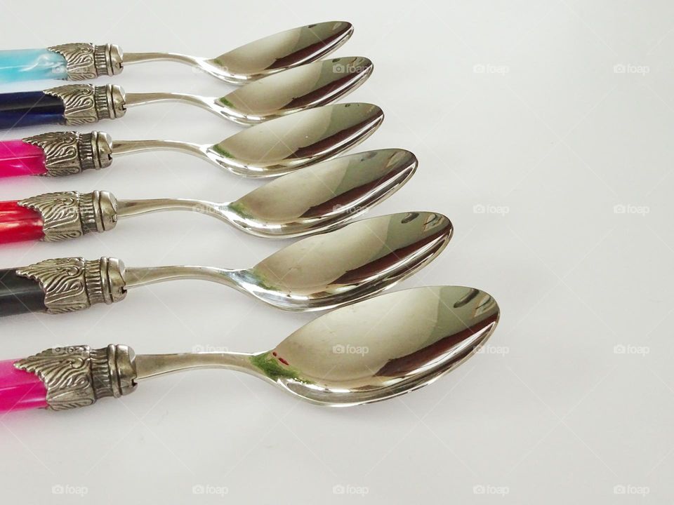 Spoons in a row