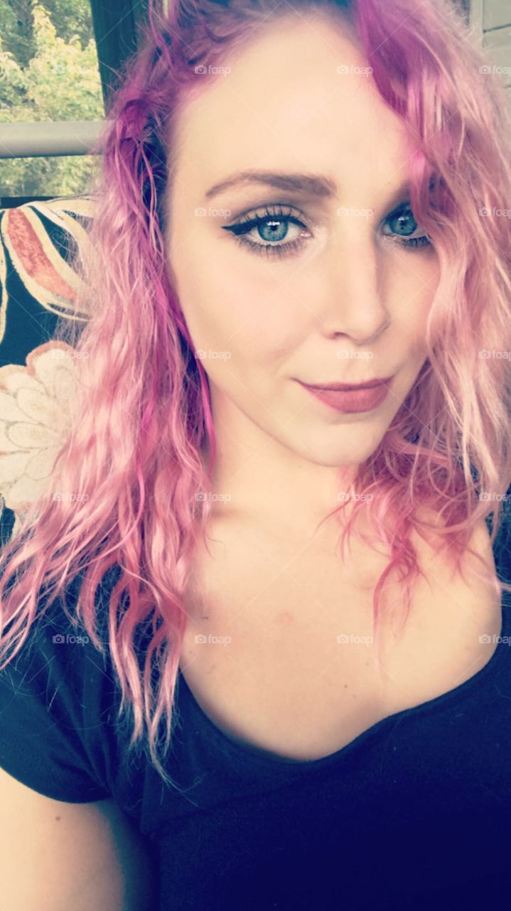 Pink hair, blue eyed girl