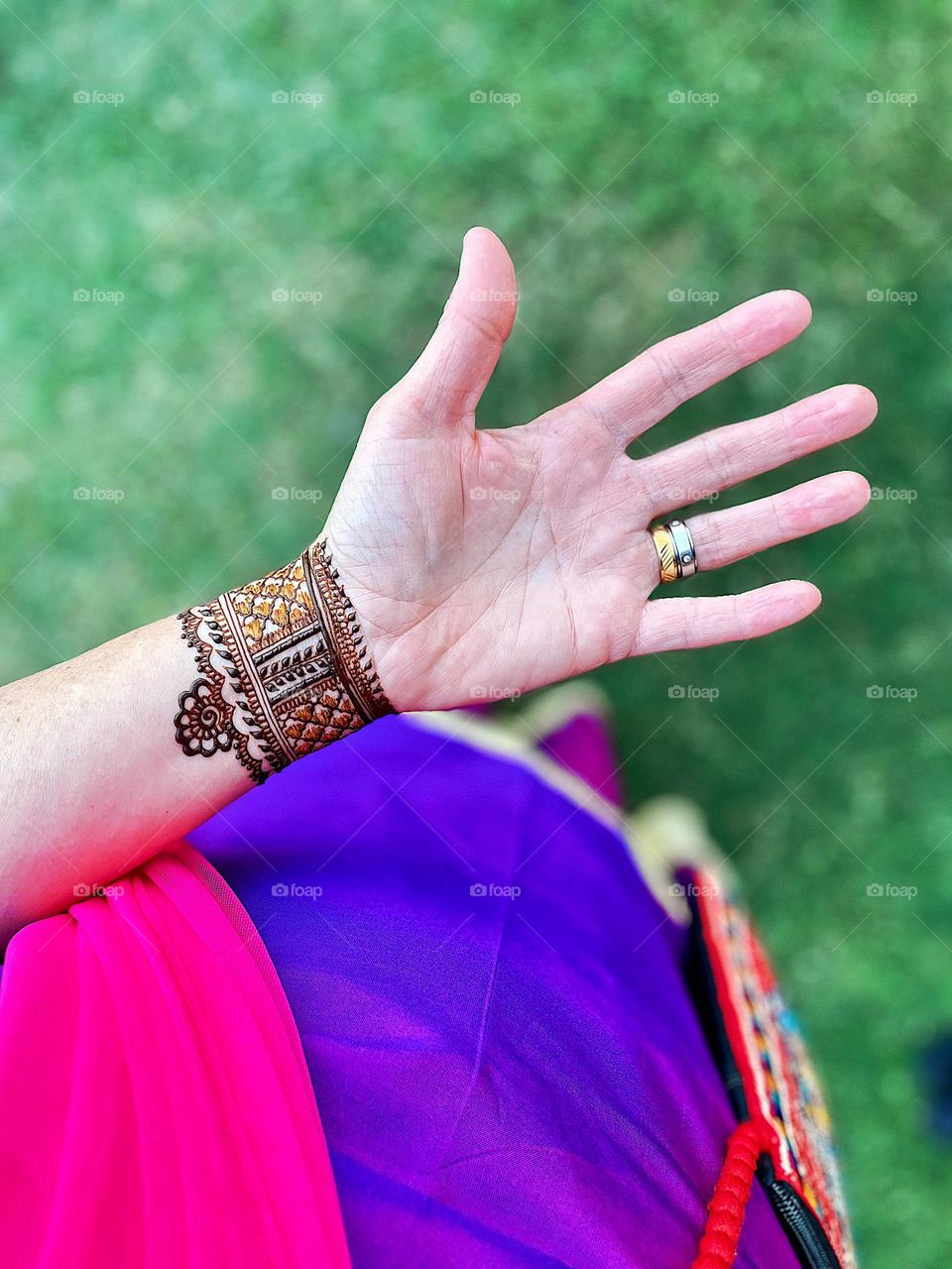 Woman at an Indian wedding, focused on culture, wedding time, henna for wedding 