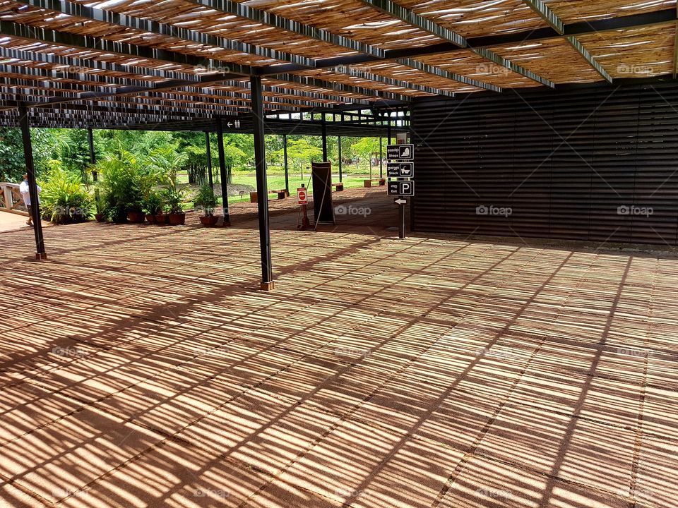 shadow of bamboo shelters