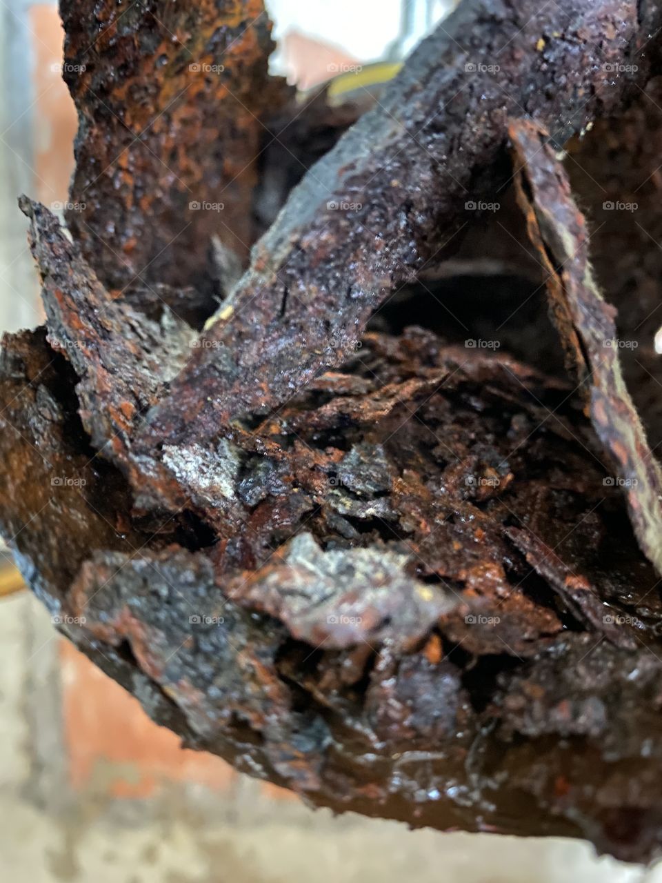 Rust flakes in old pipe 