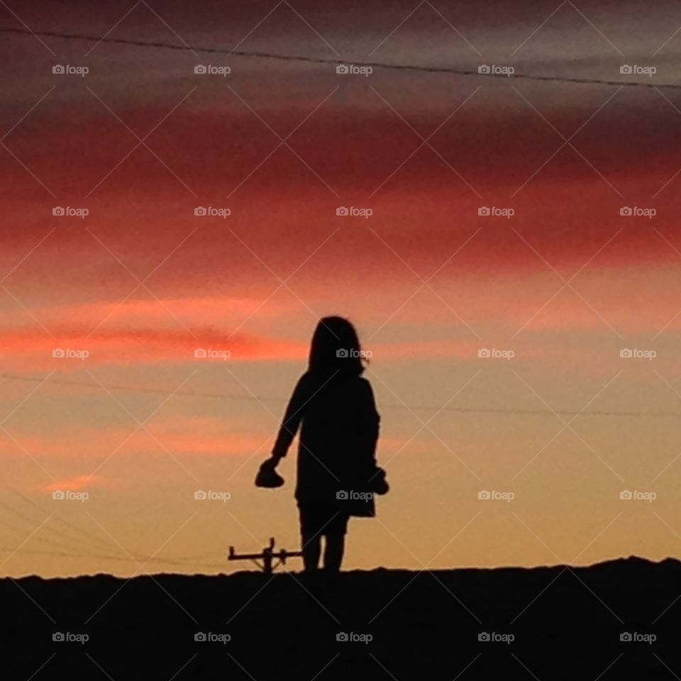 Sunset on the beach . Taking a walk on the dunes 