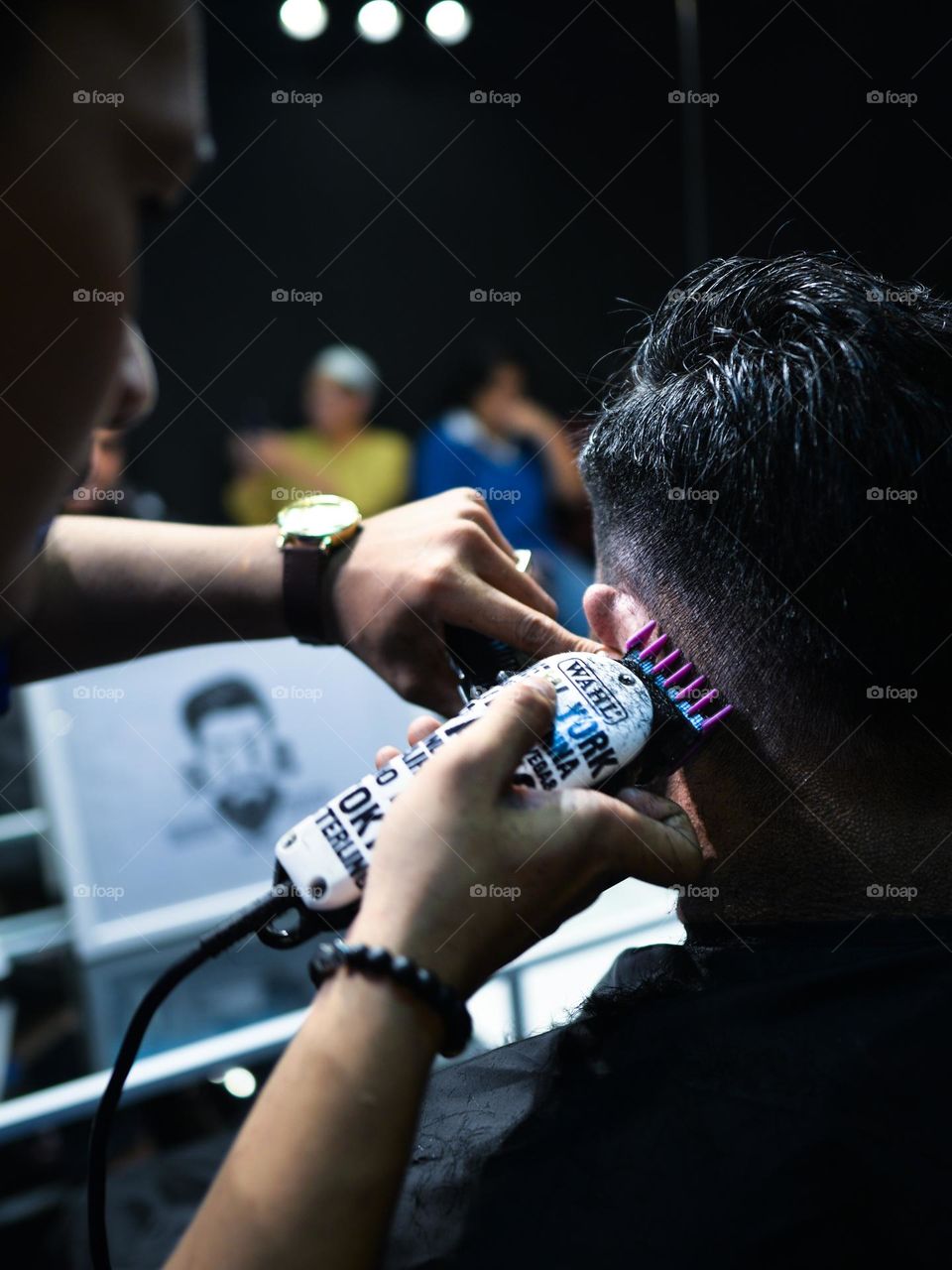 Having a haircut at a friend salon