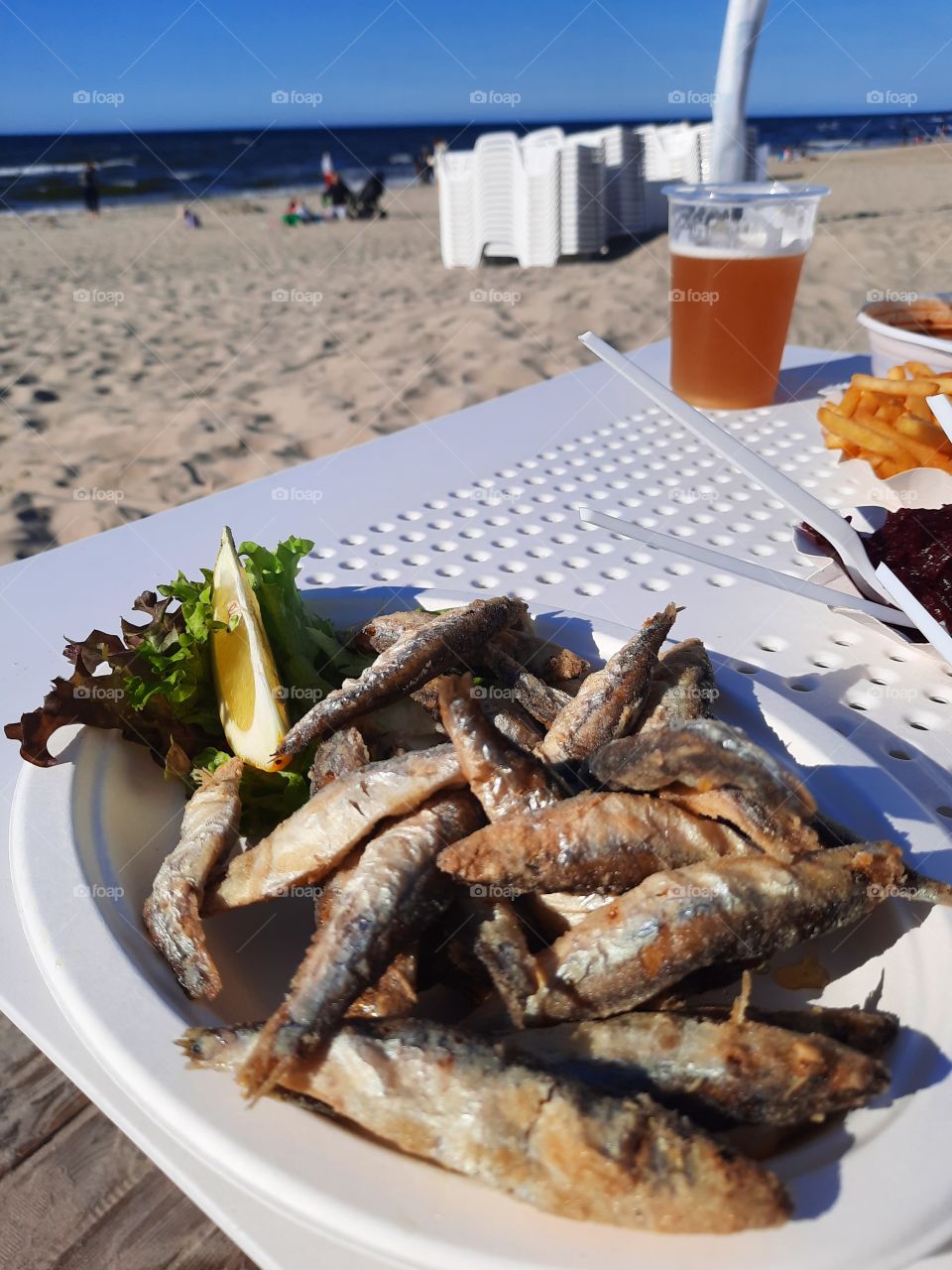 summer at the beach  with fried fish