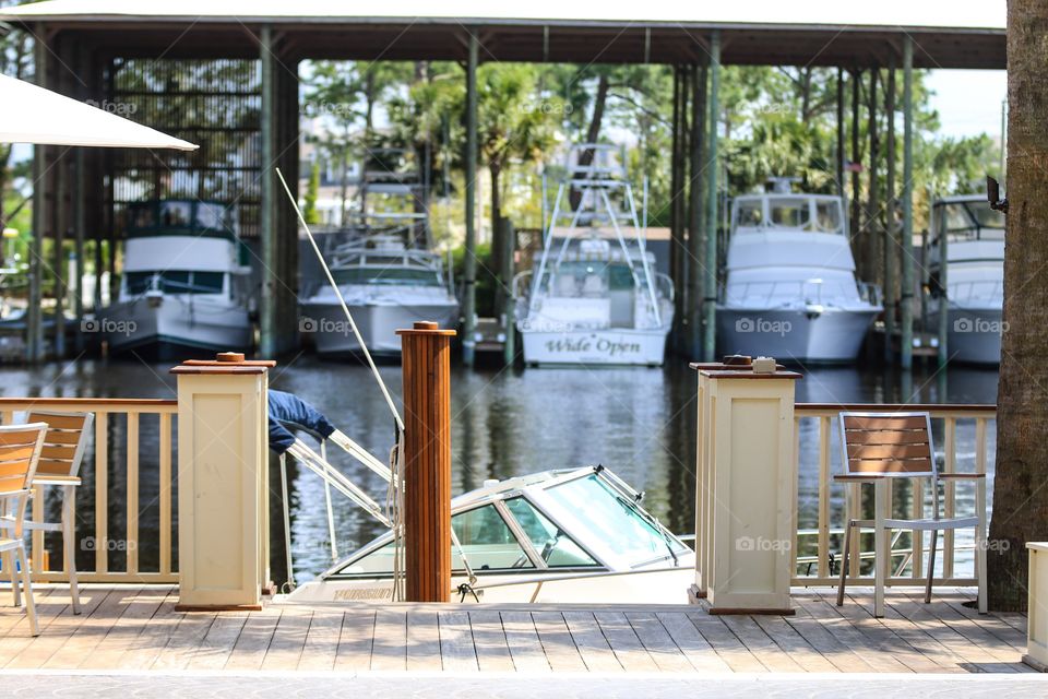 Parking dock with boat yacht in the sea port USA