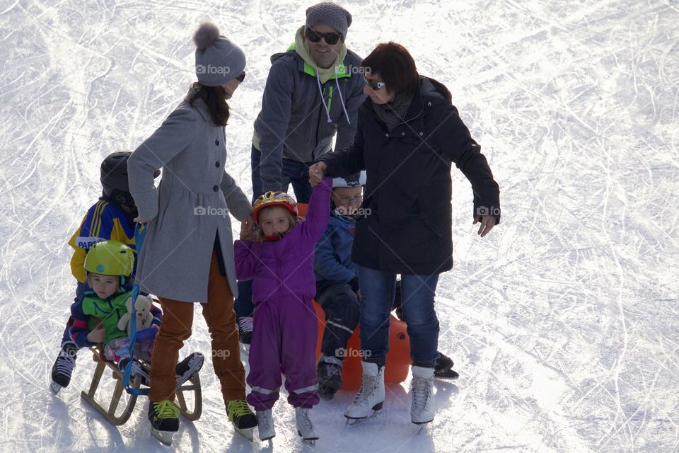 Families on ice rink