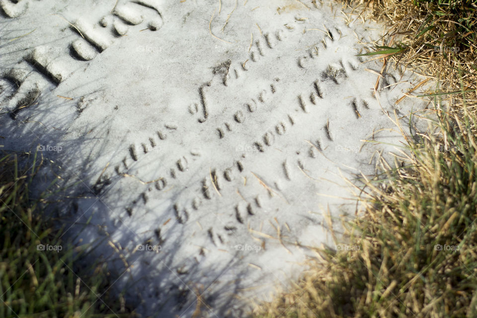 tomb. a flat tombstone with beautiful lettering