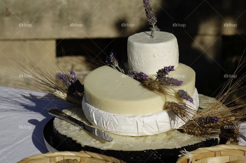 Who needs a wedding cake when you can have a pie build out of different yummy Italian and French cheeses?