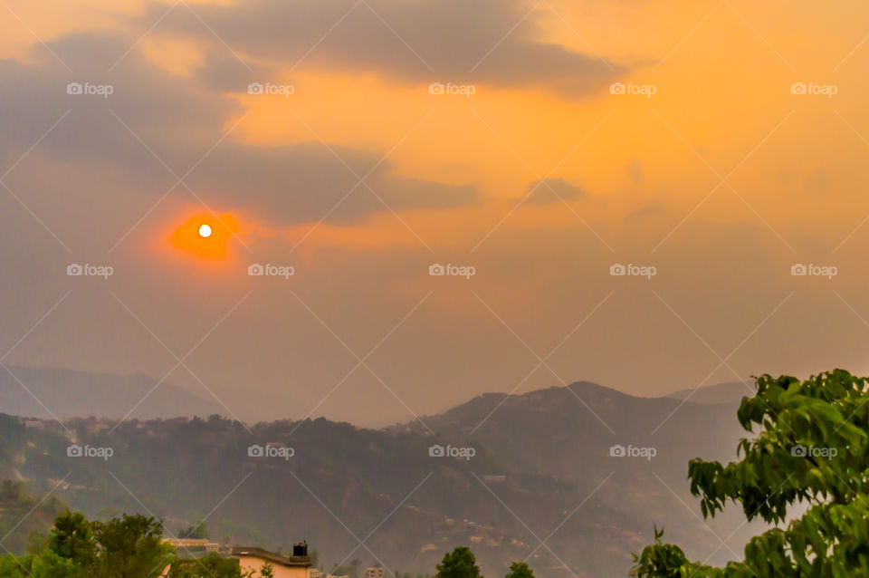 Photograph of vibrant cloudy sky at dusk dawn daytime snap in landscape style. Useful for background wallpaper screen saver e-cards website to decorate interior. Travel, Vacation, freedom, simplicity Holiday Concept. Subject is inspiration hopeful br