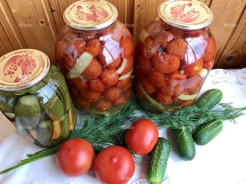 homemade pickles cucumbers and tomatoes 