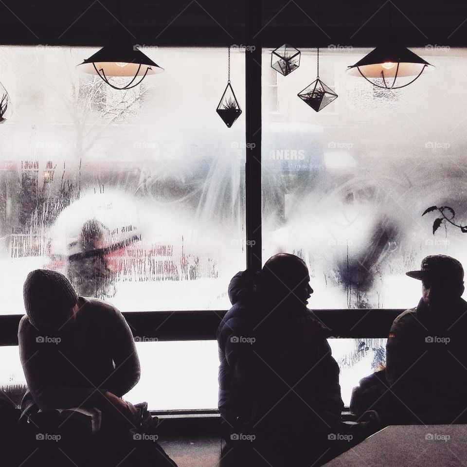 3 friends in a Cafe. 3 friends in a Cafe