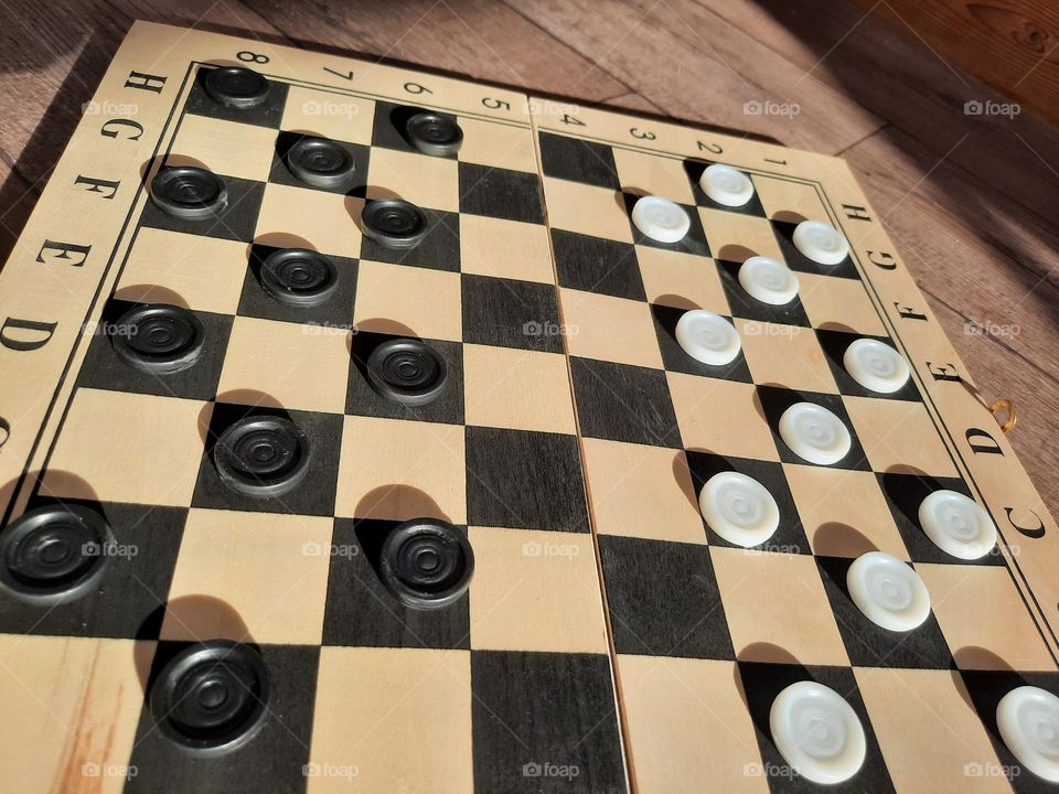 checkers, a board game based on thinking and strategy.