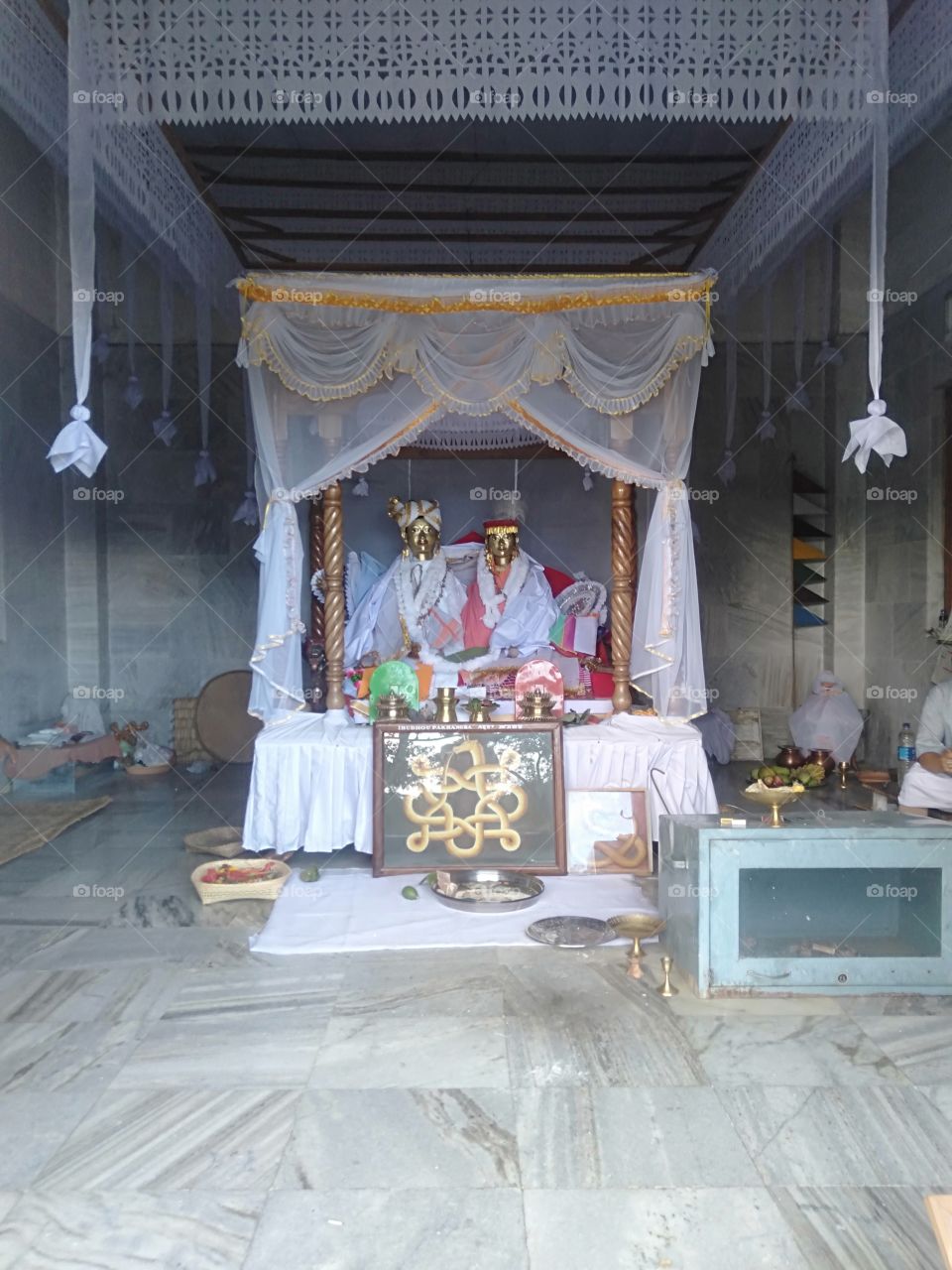 At Kangla, a palace of the Meitei Kingdom, in the heart of the Imphal City, the capital of Manipur, a state in India, the images of IBUDHOU PAKHANGBA (Male) on the left side and his wife inside the PAKHANGBA TEMPLE, a tourist destination.