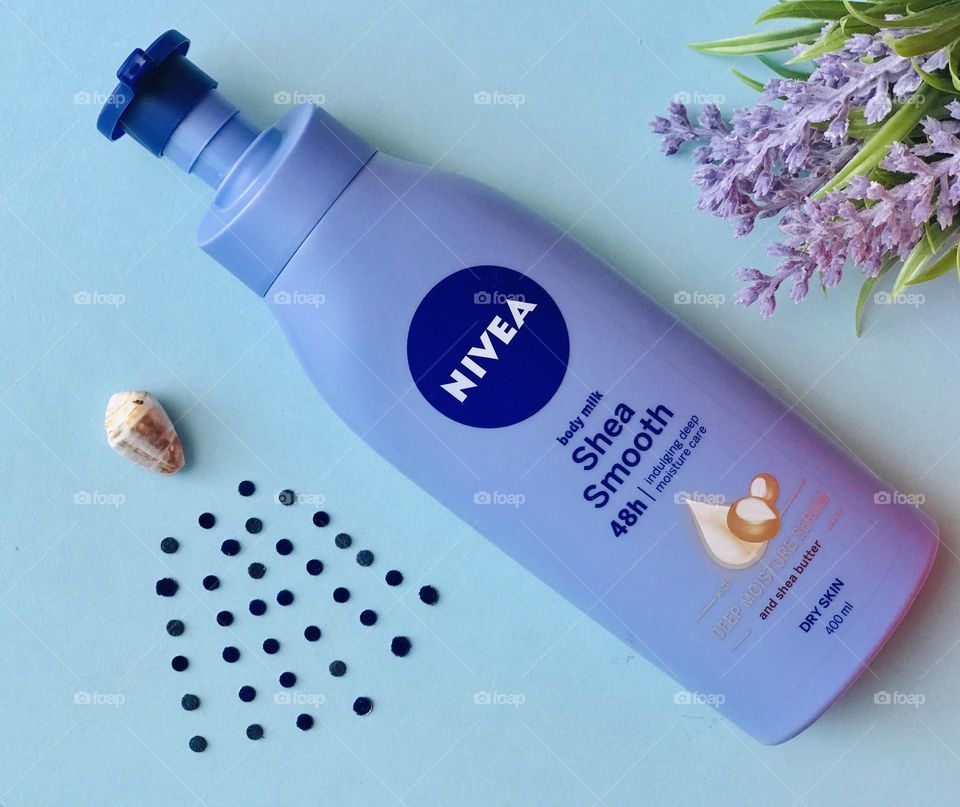 Nivea shea smooth and shell sprinkle drops,and lavender flowers.