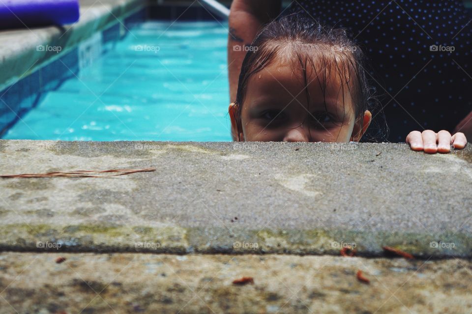 Close-up of girl in swimming pool