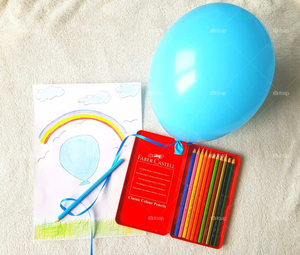 Painting of a balloon that becomes real with the help of the magic pencils