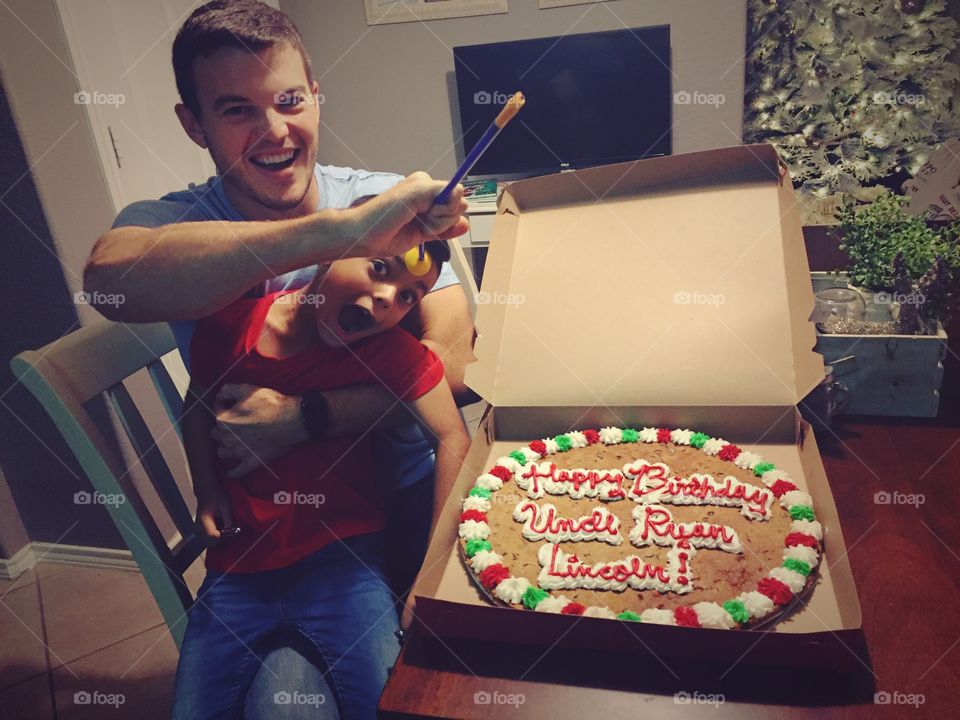 Son with his father celebrating birthday