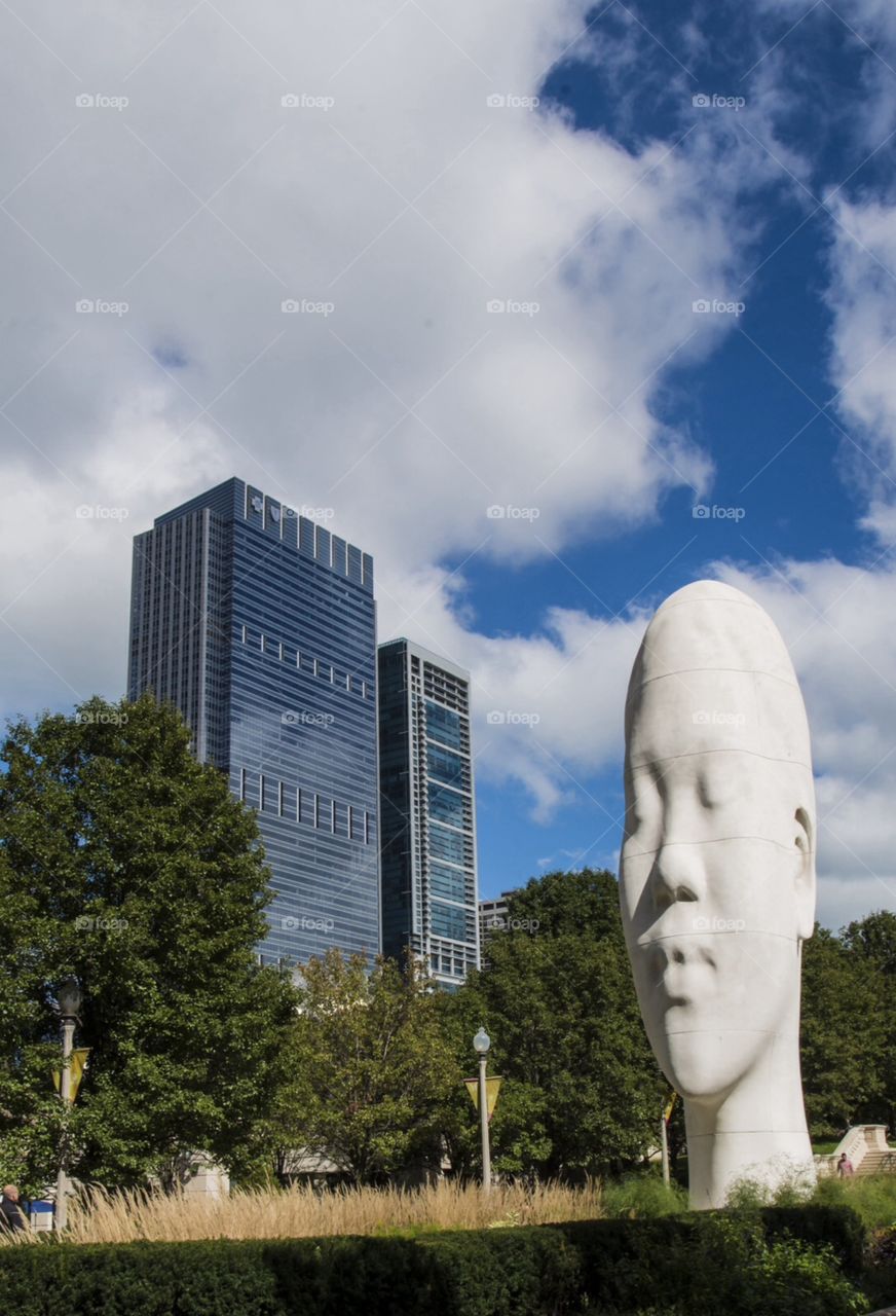 Millennium Park Sculpture. Millennium Park in Chicago , 33 ft tall sculpture ,  by Jaume Plensa from a series of sculptures of women .