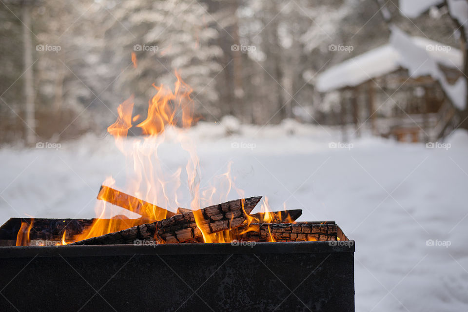 the fire in the brazier in winter