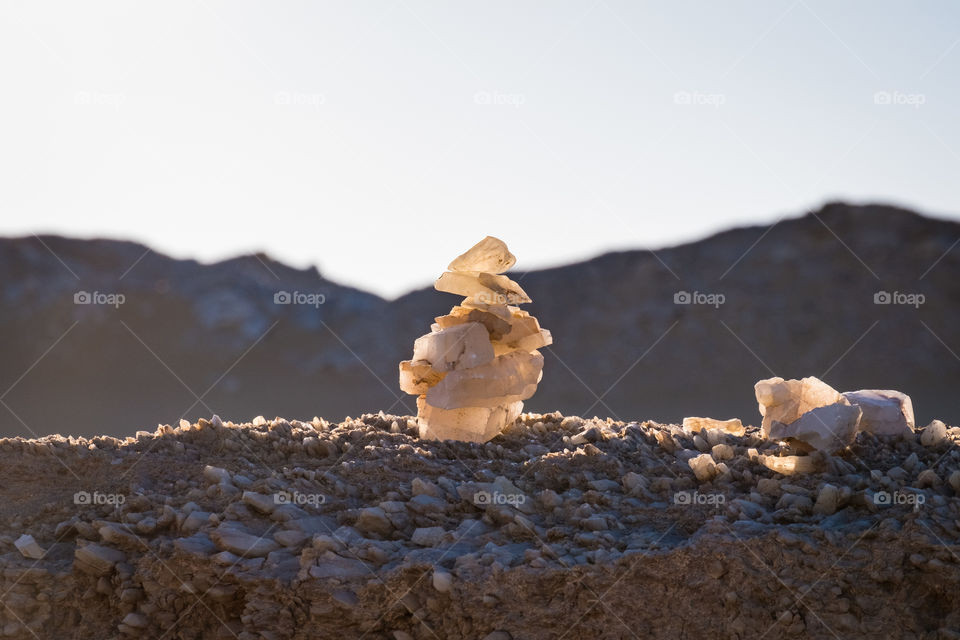 Stacking stone on desert background to show balance