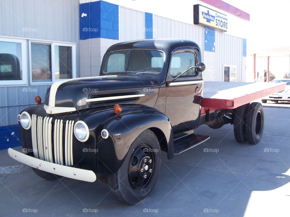 old truck outside the county service station