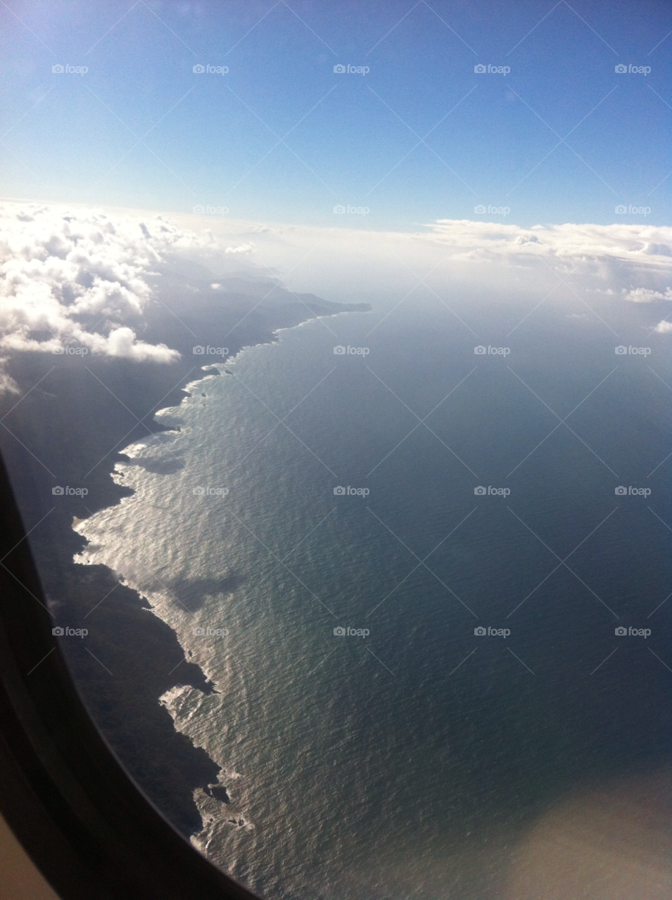 beach clouds plane sea by daflux