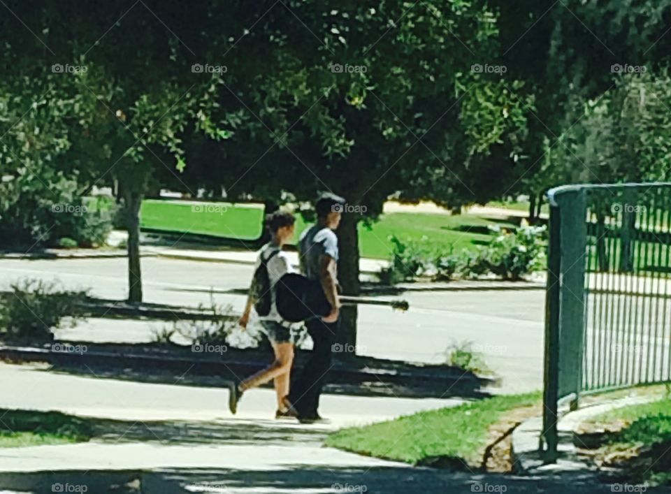 A guy, a girl, and a guitar