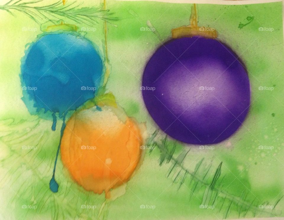 My daughters art. Airbrushed Christmas tree ornaments. Blue, purple and orange. 