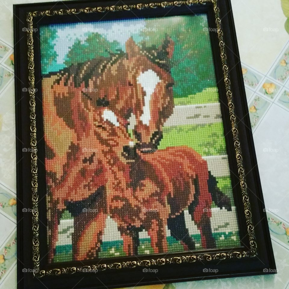 Handmade, the horses- mother and a child