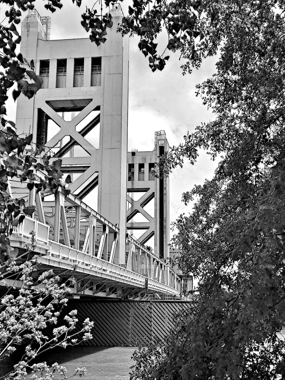 Black and white photography of a bridge in the city of sacramento california