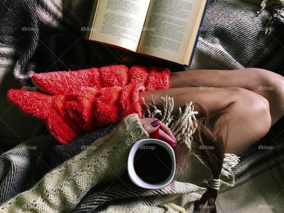 Pink home boots in cozy bed 