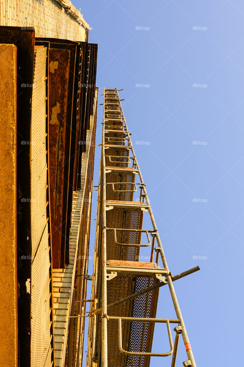 scaffolding before installation of the thermal insulation of the facade