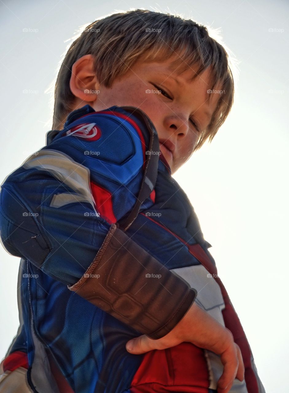 Young Boy In Superhero Costume
