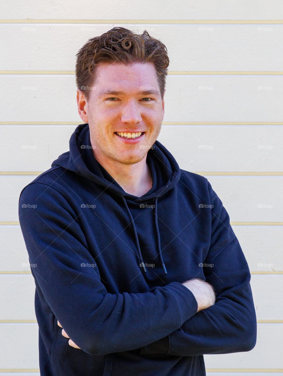 Young happy man ,smiling and happy ,about its fall and soon winter . He loves to stay outsides.